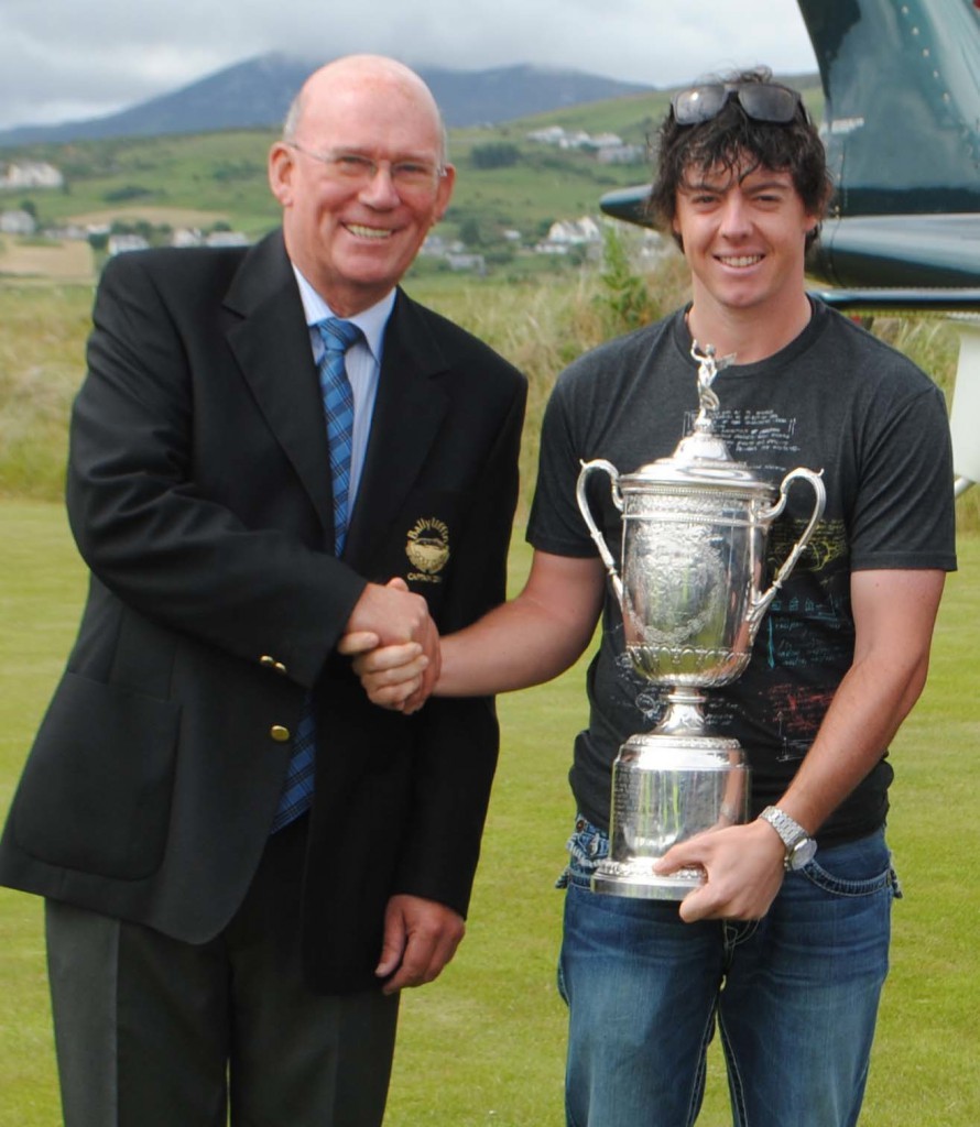 Rory McIlroy is welcomed to Ballyliffin Golf Club by club captain Colm McCarroll.