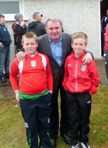 Ray Houghton pictured with Keadue Rovers underage players when he visited the county in 2012. 