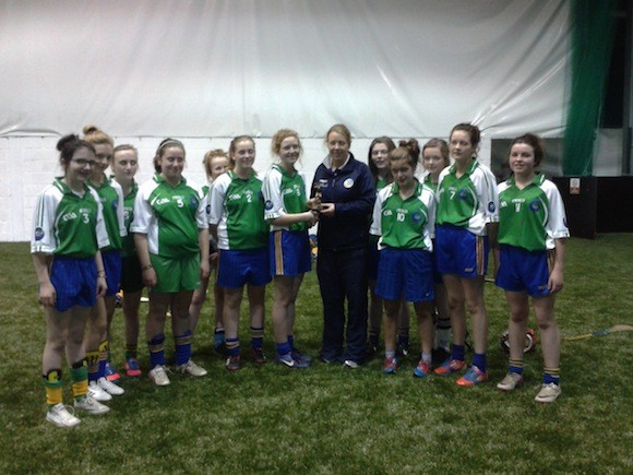 Crana College girls being presented with thier trophy by Yvonne Byrnes Regional Development Officer