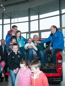 Donegal's Ice Road Trekkers return to Letterkenny Denis Ferry, Les O'Donnell and Paul Donerty are greeted by family and friends at Hegarty's Ford Garage on Sunday evening. Photo:- Clive Wasson