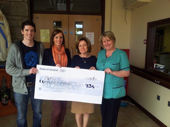  Annette and Gerard Diver of The Burtonport Annual Sponsored Kayak  committee presenting a cheque to Anne Marie and Sue of Dungloe Hospital 
