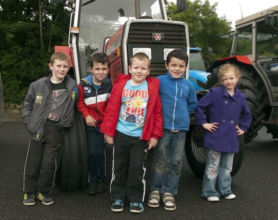 Some of the young people ready to give the machines a big send off at the Drumoghill NS Tractor Run.