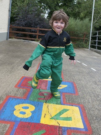 Young Oisin Higgins all suited and booted for the Drumoghill NS Tractor Run.