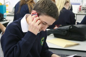 Crana College Junior Cert student Liam Arthur giving the good news to his parents