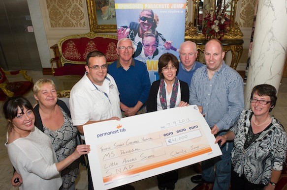 Fintan Houston with represenatives  of the four Charities, Temple Street Childrens Hospital, MS Donegal, Little Anlges School and SNAP that benifitted from the Parachute Jump earlier this year which riased €46,000 from left are Samantha Robinson, SNAP,  Carla Fennell, MS Donegal, Steve Gibson, MS Donegal, Fintan Houston,  Susan Duffy, Little Angles School, Clement Clarke, Chairman MS Donegal, Shane Gallagher, Temple Street Childrens Hospital and Bridge Clarke, MS Donegal. Photo- Clive Wasson