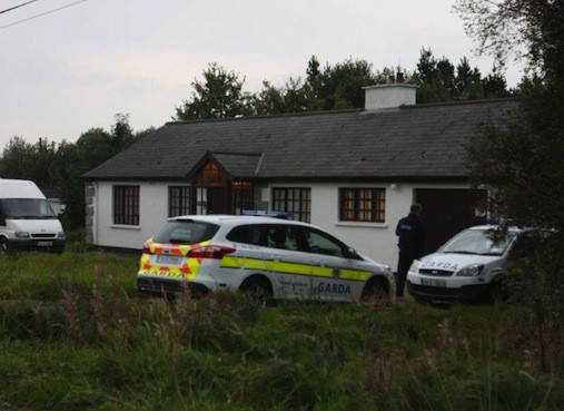 Gardai move into the house in Newtowncunningham in 2013. Pic by Northwest Newspix.