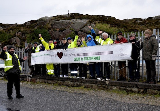 Brian Mc Daid celebrates last night as he reached the end of his walk from Derry to Burtonport  for health Awareness last night.