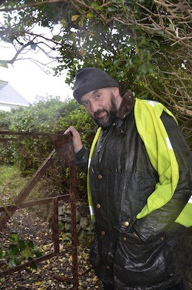 Gate closes on walk from Derry to Burtonport as Brian McDaid end his walk in Burtonport following a two week track by foot as he followed the line through Donegal to raise health awareness. Photo By Mary Rodgers