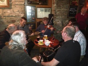 Col. Hadfield with Inishowen musicians  Photo: @McGrorysCuldaff 