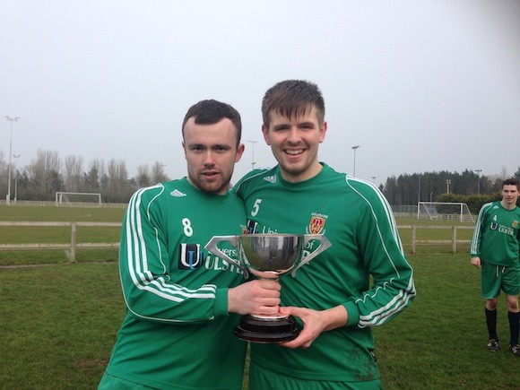 Michael, right, with the cup after leading his team to success in the Crowley Cup.