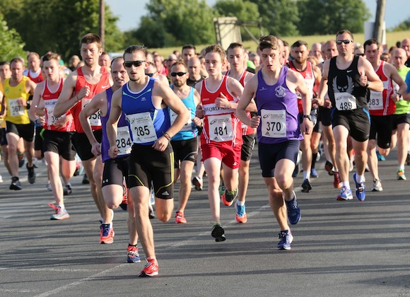 Lead runners hit the road at the start of the St. Johnston 5K Road Race earlier this evening. Pic.: Gary Foy