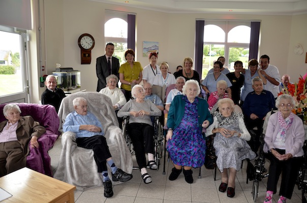 Residents and staff in the newly refurbished ‘Rosses Sitting Room’. 