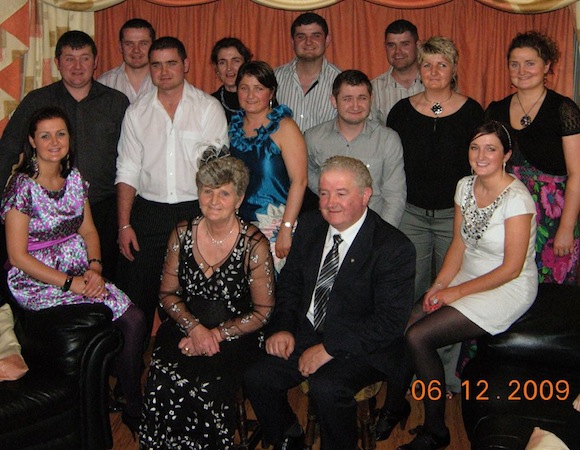 The twelve Boyle brothers and sister along with mum Ethna and dad Seamus.