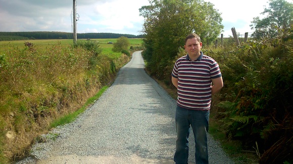 Cllr Gary Doherty at the newly-resurfaced road.