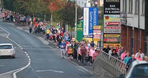 The huge crowd come back in the Port Road towards the town. PIc by Brian McDaid.