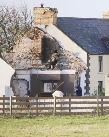Gardai at the scene of the housefire at Carnmalin PIc by Northwest News Pics. 