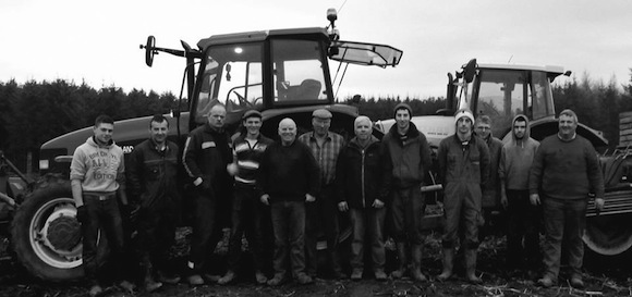 Relatives and friends of the late Kevin Woods who harvested his potato crop on Saturday.