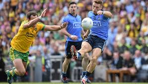 Paul Flynn under pressure from Michael Murphy during Donegal's famous victory over Dublin in the All-Ireland semi-final in August. 