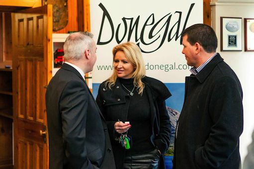 Grace-Ann McGarvey, who designed and produced the new Donegal Tourism brochure in deep conversation at today's launch.
