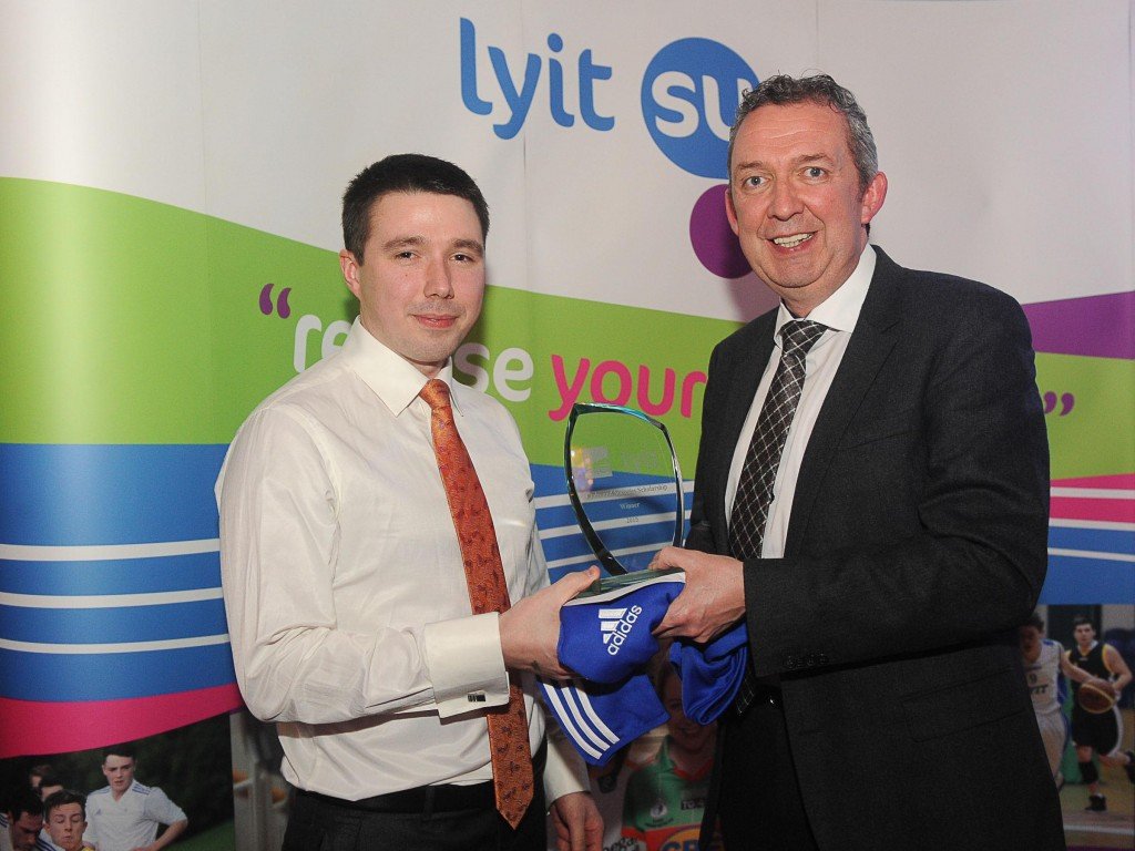 Paulius Karbauskas a member of the Android App Sociey in LyIT pictured receiving a Clubs & Societies Scholarship from Paul Hannighan , President  LYIT, Paulius has volunteered his time along with Android App colleagues in teaching programming to children groups and also to Transition Year students in Colaiste Ailigh, Leitirceanainn.
