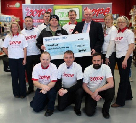The Cope presents John Gillespie of WAAR with their sponsorship cheque. 