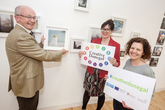 Michael Tunney, Head of Enterprise, Donegal Local Enterprise Office, putting the finishing touches to one of the displays for the launch of the new Donegal Creative Strategy next week. Also included in the photo are (centre) Grace Korbel of Donegal Local Enterprise Office and Fiona Higgins of Donegal Designer Makers.