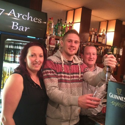 Jason with landlords Geraldine and Trevor Love at the 7 Arches Bar in Laghey.