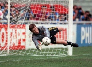 packie-bonner-saves-a-penalty-in-the-shoot-out-1990-8-390x285