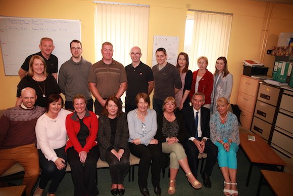 Eileen with many of the Errigal College current staff: Back Row: Roseann Boyle, Hugo Dorrian, David McHale, Sean Molloy, Michael McMenamin, Stephen Gibson, Patricia Kelly, Catriona Sweeney and Katy Mulhern Front Row: Eoghan Megannety, Catriona Kelly, Niamh Cullen, Cathy Rafferty, Eileen Maguire, Geraldine McDonald, Prin. Mr Charlie Cannon and Margaret Russell