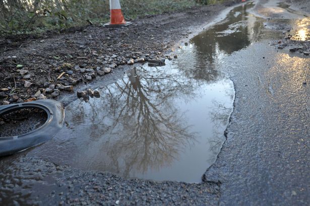Potholes-and-damaged-road-surfacing
