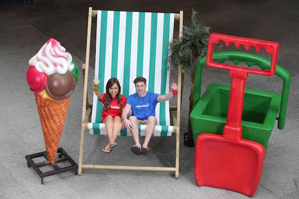 BIG IN BELFAST: Shannon Webster and Ben McDowell put their feet up on a giant deckchair at the launch of Jet2.com and Jet2holidays’ BIGGEST EVER flights and holidays programme from Belfast International Airport. 