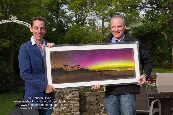 Brendan Diver presents Tubs with one of his famous Northern Lights pictures