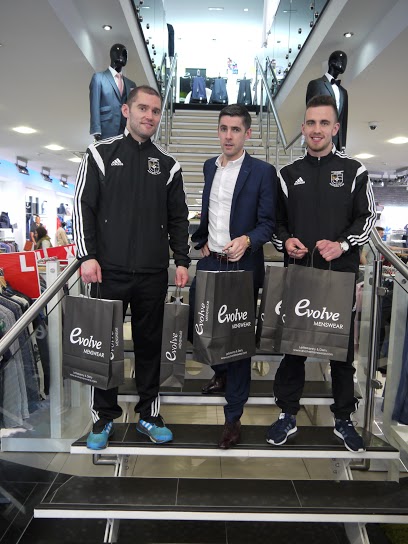 Letterkenny Rovers players Darren McElwaine and Paul McVeigh pictured with JP McCloskey of Evolve Menswear. 