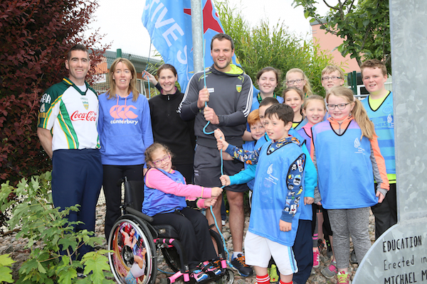 Michael Murphy who was the special guest at Glenswilly N.S. for the raising of the Active Blue Flag pictured with children and teaching staff including  Miss Mc Brearty and Miss Mc Devitt  and principal Joseph Gallinagh. Photo David McDaid/Cristeph