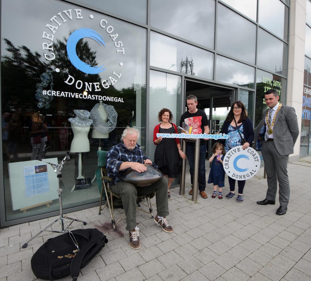 Harald Jungst,playing a hand pan for Fiona Higgins, Liam Porter,  Grace Corbel, LEO and John Pat McDaid as he is taking part in the Letterkenny Chamber Shop LK busking Competition in Letterkenny on Saturday last.  Photo Clive Wasson