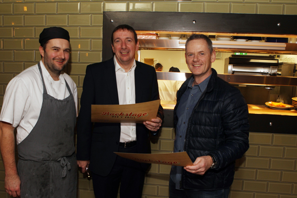 Mark Doherty with special guest Highland Radio's John Breslin and head chef Mark Greer at the opening of back stage in Letterkenny. Photos Brian McDaid