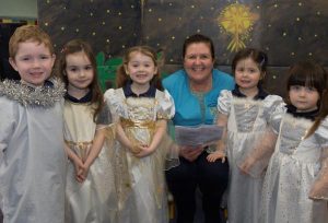 Sally Kelly with children at the Raphoe Community Playgroup. (North-West Newspix)