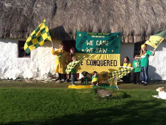 Photo of Patsy Boyle and Family Dungloe (with banner from 1992 game)