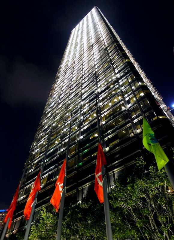 Flags flying at half-mast outside the Cheung Kong Center, Central Hong Kong, in the wake of the 2012 Lamma Island Ferry Disaster