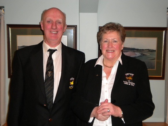 Portsalon captain Joe Harkin with Club President Kathleen McCormick