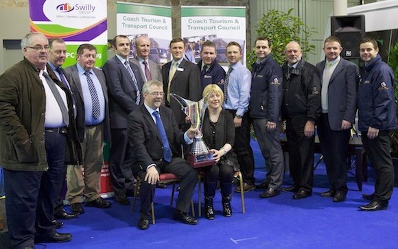 The Swilly Group team who organised, stewarded and ran the inaugural Irish Coach Driver of the Year on behalf of the Coach Tourism and Transport Council (CTTC) of Ireland which was run at the biannual Campion Insurance Bus & Coach show at the RDS Dublin in November 2012. Pictured seated are Anne Guilfoyle, widow of late Martin Guilfoyle, and Derry Cronin of Cronin’s Coaches who received the Martin Guilfoyle Perpetual Cup award on behalf of his driver Philip Duffy. Also included, standing centre, is Gerry Mullin, chief executive of the CTTC. 