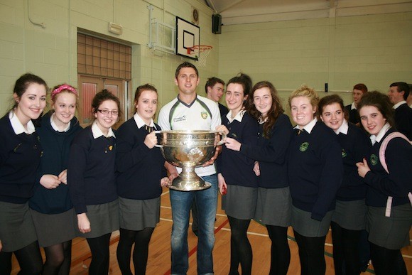 Current  and past pupils of Crana College pictured with Sam Maguire