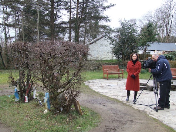 Eileen Magnier, North West Correspondent, RTÉ with cameraman John McMorrow at Doon Well (near Kilmacrennan) filming part of the feature on the survey of holy wells to be broadcast on Good Friday on RTÉ 1 at 7 p.m.