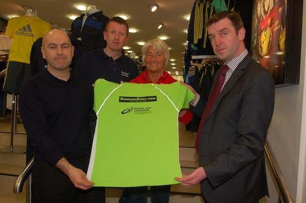 Sponsors Stephen Maguire of Donegal Daily, Lee Glidea of Donegal Creameries and Brian McCormick of Brian McCormick Sports with Grace Boyle from the North West 10k