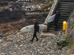 Kin and Shane head out to catch some waves at Marble Hill