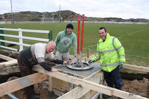 Patrick McGinley, Owenie McGarvey and Charles Doogan on the job as the first Floodlight base goes in.