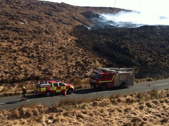 Smoke billows from bogland at Corveen in Gaoth Dobhair close to roads