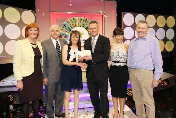 Maureen Gamble, from Carndonagh Co Donegal won €32,400 on last Saturday’s (11th May 2013) National Lottery Winning Streak TV Gameshow held in RTE. Pictured at the presentation of winning cheques were from left: Lydia Carlin, The National Lottery ticket selling agent from Simpsons, Tulnaree, Carndonagh Co Donegal. Marty Whelan, Gameshow Host. Maureen Gamble, winning participant. Dermot Griffin, Chief Executive, the National Lottery, Geri Maye, Gameshow Host and Joe Carlin also The National Lottery ticket selling agent from Simpsons, Tulnaree, Carndonagh Co Donegal Pic Mac Innes Photography.