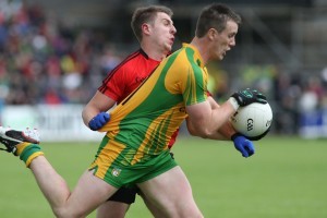 Donegal's Leo Mc Loone attacks the Down defence during the first half of their Ulster Senior Football Championship match in Breffni Park ,Cavan today. PIC: Gary Foy