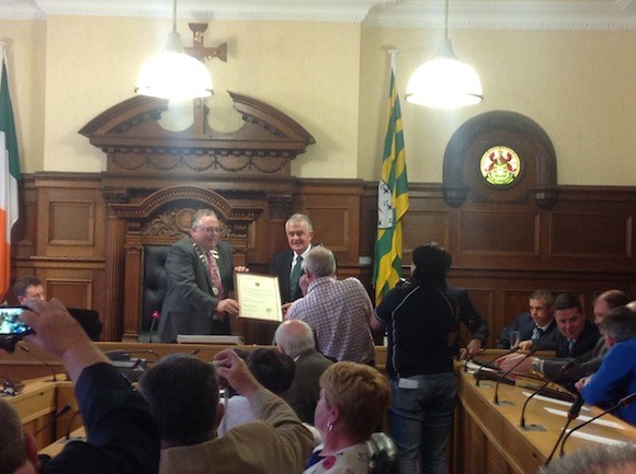 Patsy gets his award from Mayor McBrearty